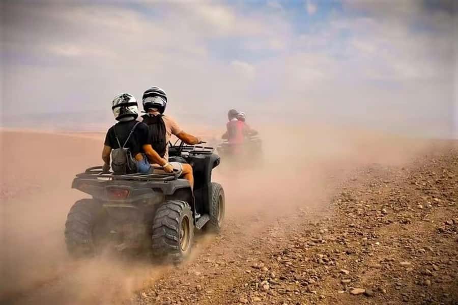 Marrakech: Agafay Desert Quad Biking, Camel Ride Fire Show - Agafay Desert: Rocky, Close, and Built for Sunset