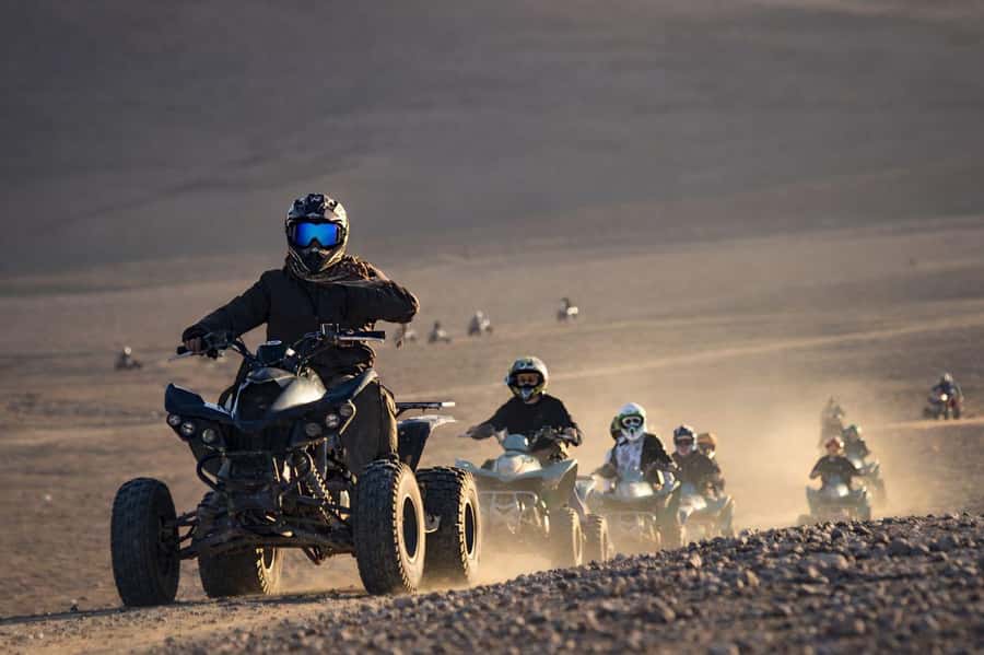 Marrakech: Agafay Desert Sunset Camel Ride, Quad & Dinner - Quad riding in the Agafay Desert: thrill, rules, and picture breaks