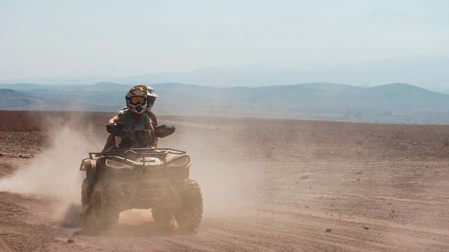 Marrakech Desert Sunset: Quad Biking, Dinner & Fire Show - The argan oil cooperative stop: a quick culture add-on