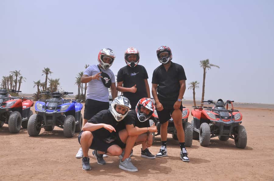Marrakech: Palm Grove and Jbilat Desert Quad Bike Tour - Guides and service details: what you’re likely to experience