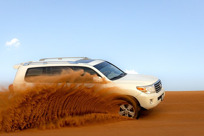 Morning Desert Safari, Quad Bike, Sandboard and Camel Ride - Quad Bike Time: 25 Minutes Inside a Fenced Adventure Zone