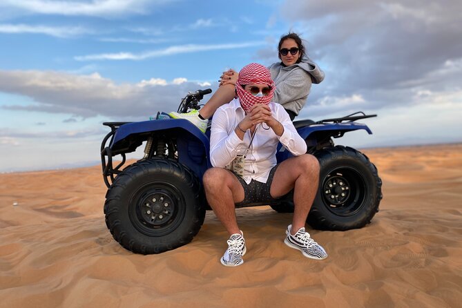 Morning Desert Safari, Quad Bike, Sandboard and Camel Ride - Sandboarding: A Short Try That Still Works for Beginners