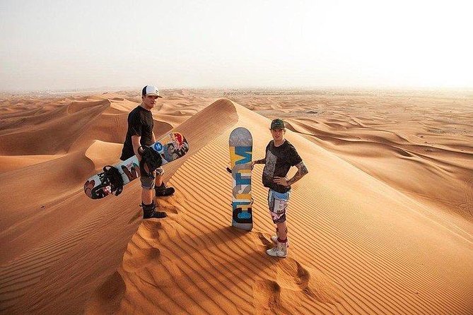 Morning Desert Safari with Quad Bike, Camel Ride & Sandboarding - Quad biking and camel riding: two textures of desert fun