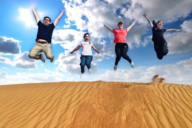Morning Desert Safari with Quad Biking - Camel ride in the red sand: a classic moment that stays short and sweet