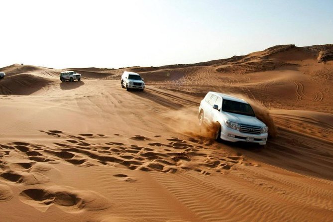 Morning Desert Thrill: Quad Bike Safari Escape - Getting Out of Dubai: The Pickup and the Desert Drive