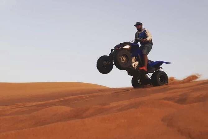 Morning Quad Biking & Red Sand Desert Safari , Camel Ride, Sand Boarding - Sandboarding on the Dunes: The Activity That Feels Most Like Play
