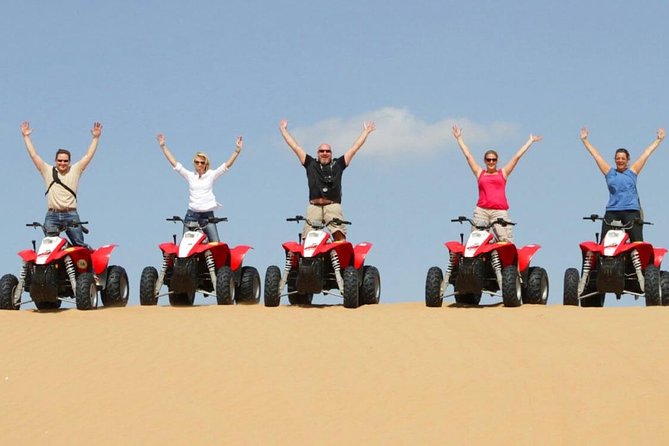 Morning Red Dunes Desert by Quad Bike, Dune Bashing, Camel Ride & Sandboarding - Pickup and ride comfort across Dubai or Sharjah