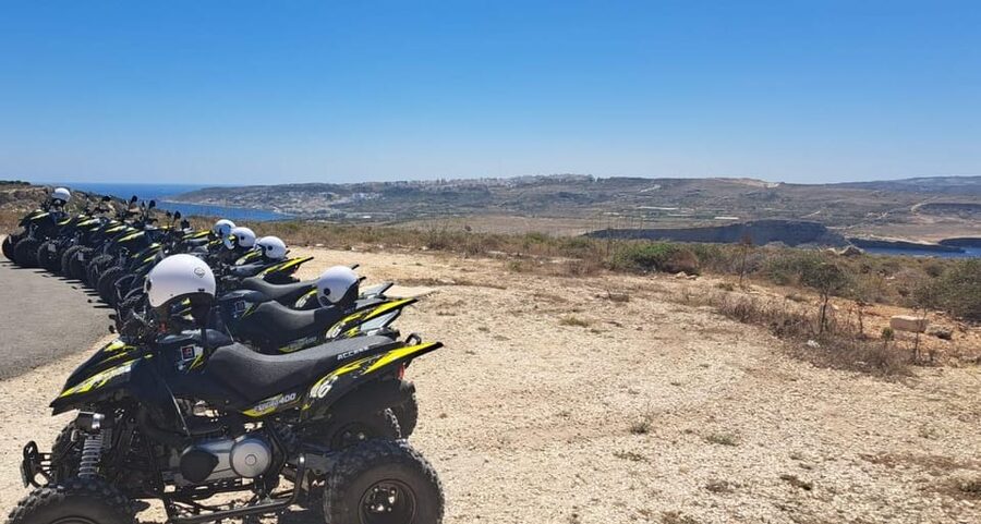 North Malta: Quad Bike Tour with Scenic Land, Sea & Swimming - The Popeye Village drive: filmset views plus real coastline context