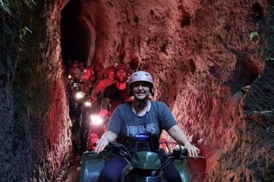 OFFICIAL ATV KUBER - Tunnel, Waterfall, Rice Field, River, Jungle - Safety setup: boots, helmet, and a guide keeping pace