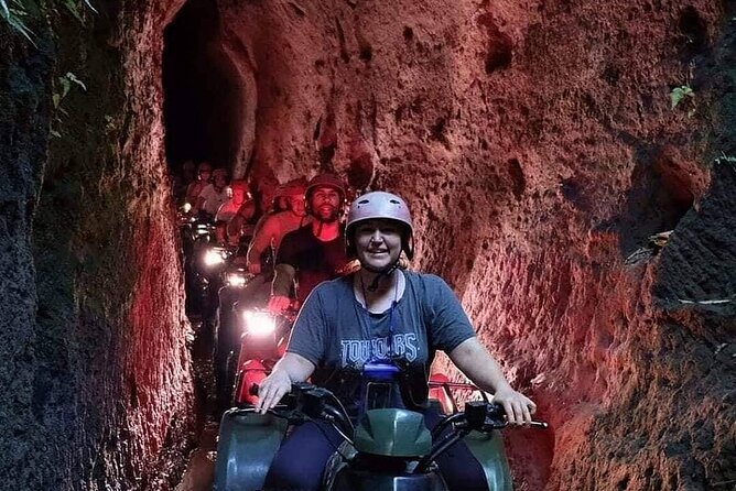OFFICIAL ATV KUBER - Tunnel, Waterfall, Rice Field, River, Jungle - Safety setup: boots, helmet, and a guide keeping pace