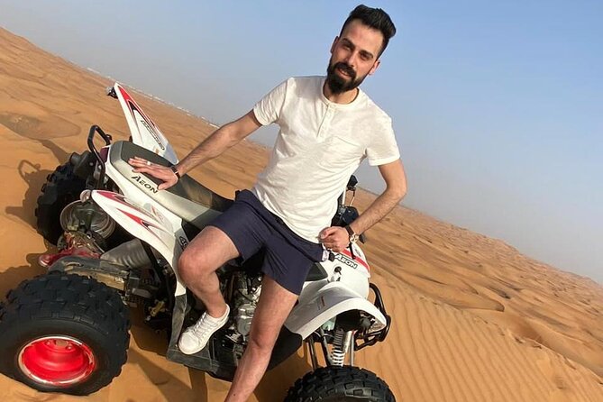 One hour Quad Bike at Red Sand Desert Safari with Camel Ride and BBQ Dinner - One Hour of Self-Drive Quad Bikes: How to Get the Most Fun