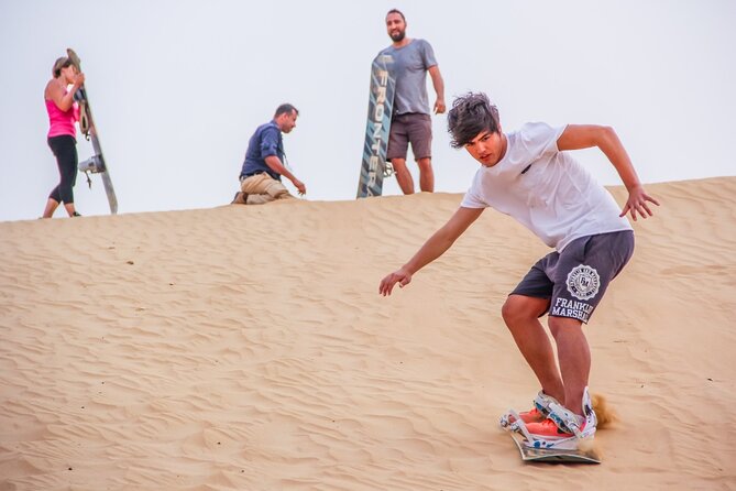One hour Quad Bike at Red Sand Desert Safari with Camel Ride and BBQ Dinner - Camel Ride, Henna, and Sandboarding: Slower Moments That Make It Feel Real