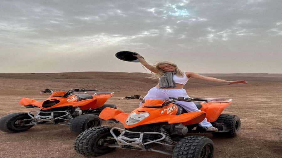 package: Agafay dinner, Sunset, show , Quad or Camel Ride - The Moroccan dinner in a tent: tagines, couscous, and dessert with live entertainment