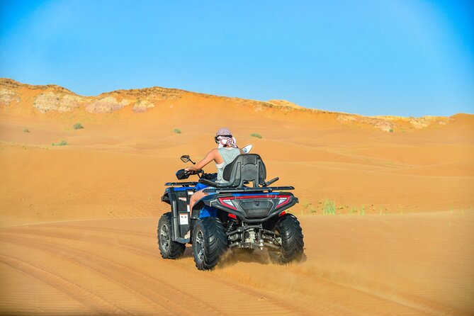 Polaris 570cc (4x4 )Quad Bike Ride +Sand Boarding- Red Dunes - The 15-Minute Camel Ride: Tradition Without Dragging the Day
