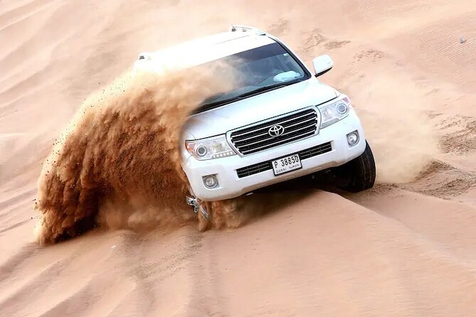 Premium Evening Desert Safari, Quad Bike, Camel & VIP BBQ Dinner - Quad Bike Time at Al Madam: The Fun Part, With a Safety Brief First