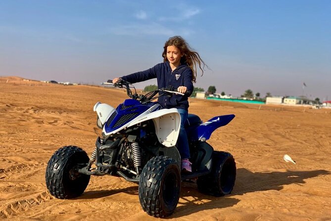 Premium Evening Desert Safari, Quad Bike, Camel & VIP BBQ Dinner - Al Aweer Desert Camp: Tanoura, Belly Dance, Fire, Henna, and a Camel Ride