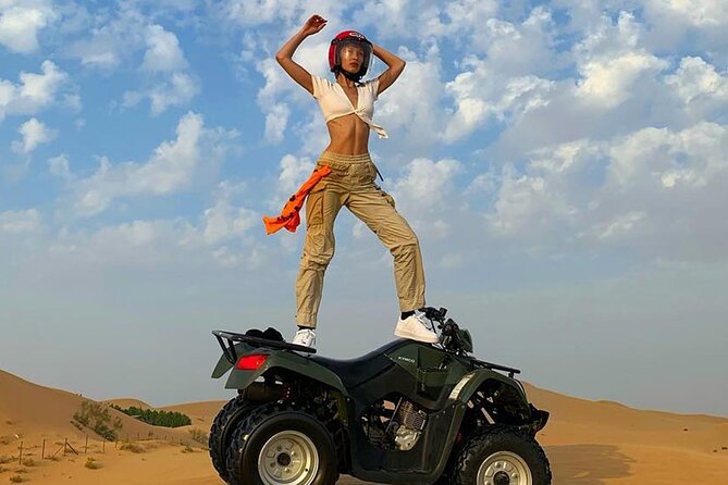 Premium Evening Desert Safari with Quad Bike, Camel Ride and BBQ Dinner - Quad bikes over the dunes: what 30 minutes feels like