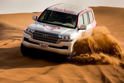 Premium Morning Red Dunes with Quad Bike - Pickup and drop-off in a Dubai land cruiser (and why it’s valuable)