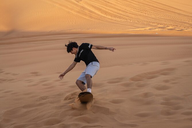 Premium Red Dunes Bashing with Quad Bike, Camel, Falcon &VIP Camp - Quad biking in the desert: 30 minutes, self-drive, no license