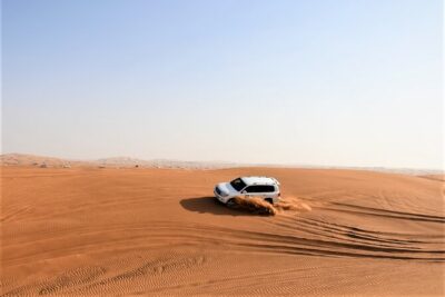 Premium Red Dunes Bashing with Quad Bike, Camel, Falcon &VIP Camp - Lahbab Red Dunes: dune bashing plus sandboarding