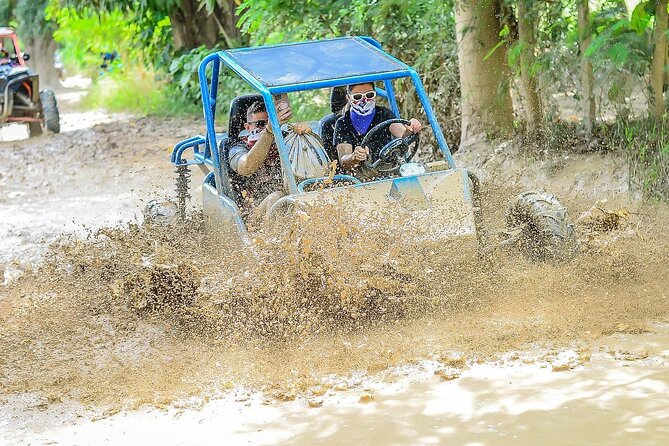 Punta Cana Off-Road Buggy Tour Macao Beach and Cave Experience - Macao Beach time: sand, waves, and limestone cliffs nearby
