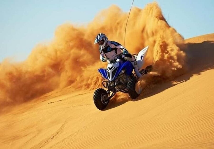 Qatar: ATV & Quad Dune Bashing, Camel Ride, & Sandboarding - Dune bashing with an expert driver: fast, bumpy, and managed