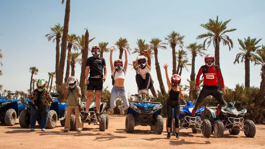 Quad Bike Activity in Marrakech Palmeraie - Quad bike setup: helmet, goggles, and practical gear