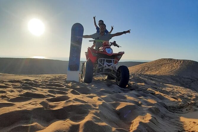 Quad Bike and Sandboarding on Sand Dunes Wild Beach - Quad biking across sandy trails, rocky sections, and eucalyptus green
