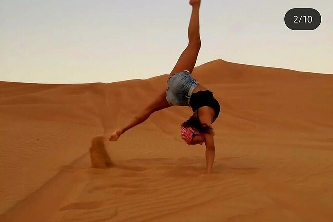 Quad Bike Dubai Desert Safari with BBQ Dinner Sandboard and Show - Al Aweer Desert Camp: Camel Riding, Henna, and Arabic Photo Moments