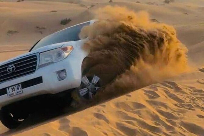Quad Bike Dubai Desert Safari with BBQ Dinner Sandboard and Show - Lahbab Desert: Quad Bikes, Dune Bashing, and Red-Dune Sunset Photos