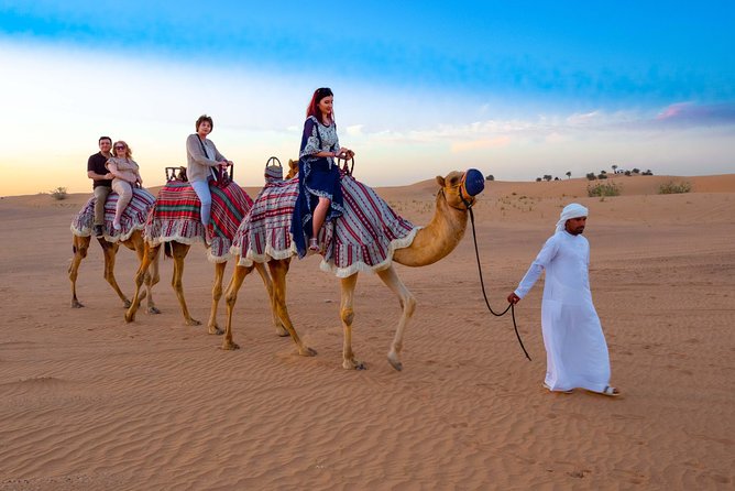 Quad Bike & Premium Desert Safari, with BBQ Dinner with 6 shows - Dune Bashing, Sand Boarding, and Camel Ride: The Desert Hits, Organized