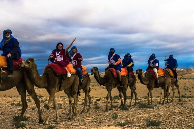 Quad Biking & Camel Ride in Agafay Desert with Dinner Show - Camel ride in nomad dress: what to watch for before you climb on