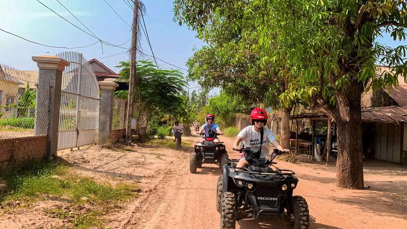 Siem Reap: Khmer Village and Fish Farm ATV Tour - Rice Paddy Fields and Working Farms: Seeing the Green Machine Up Close