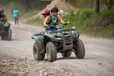 Sierra Madre Horseback Riding and ATV Tour - ATV riding through villages: fun miles with a reality check