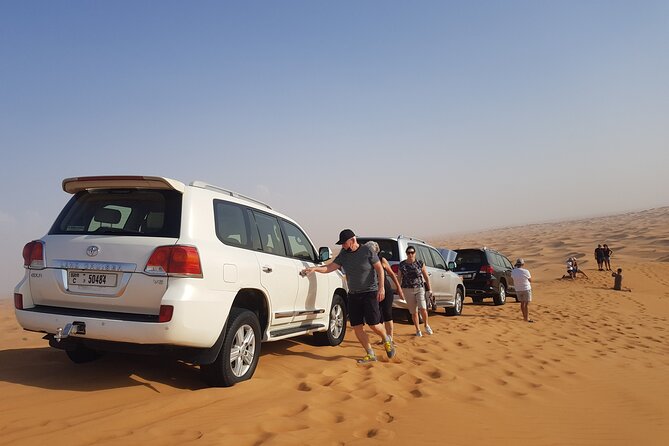 Sunrise Desert safari With Quad bike ride Sandboard & Camel ride - Camel Ride on the Dunes: Quick, Classic, and Photo-Friendly