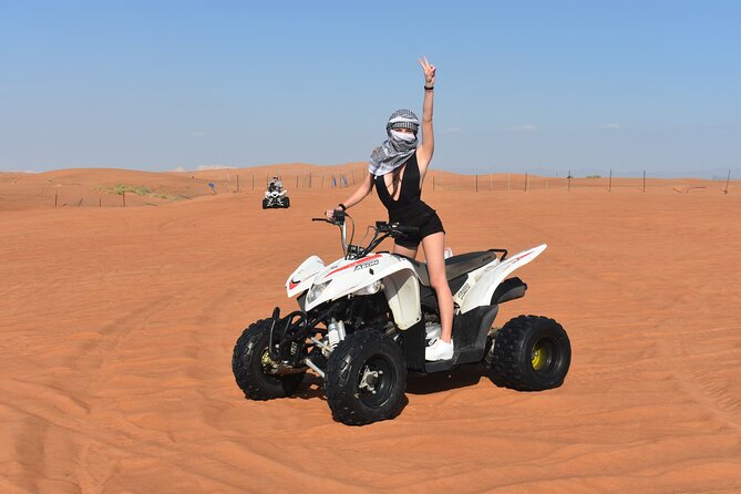 Sunset Desert Safari Quad bike Camel ride Sand Board & BBQ Dinner - Quad Biking, Dune Bashing, and the Real Point of a Sunset Safari