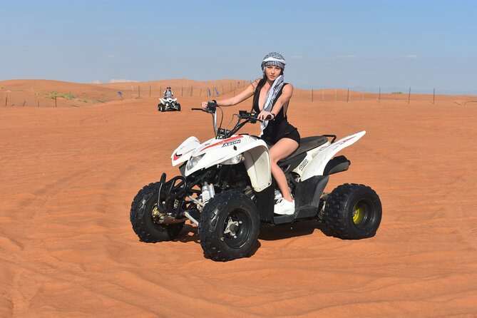 Sunset Desert Safari Quad bike Camel ride Sand Board & BBQ Dinner - Stop 1 in Lahbab: Quad Bikes, Dune Bashing, and Sunset Pictures