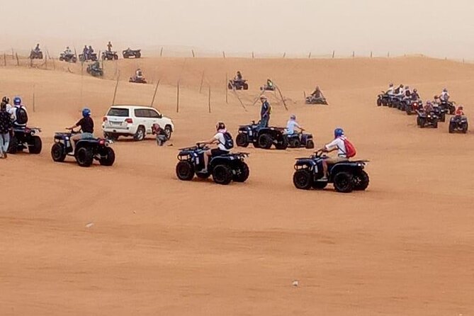Ultimate Desert Experience Quad Bike, Sandboarding, Camel Ride - The dinner show: Tanoura, fire, belly dance, and more