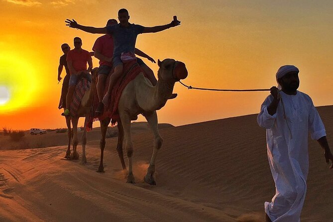Ultimate Desert Experience Quad Bike, Sandboarding, Camel Ride - Timing and pickup: when your hotel day turns into desert night