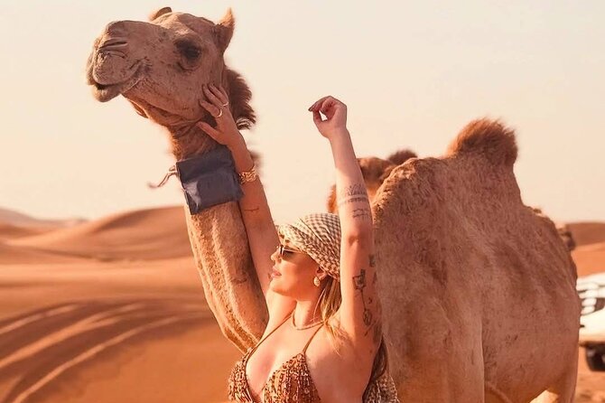 Vip Evening Desert Safari with quad bike,Camel Riding & Dinner - Stop 2: Lahbab Red Sand Desert—dune bashing, quad biking, and sunset views